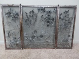 Ornate metal fireplace screen, 48