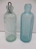 Two aqua Chicago bottles, Blob Hutchinson, V Donat and Arthur Christin, 7