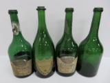 Four vintage high end champagne bottles, Dom Perignon and Taittinger