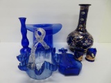 Seven pieces of cobalt glass