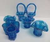 Eight pieces of blue patterned Fenton glass