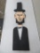 Folk art wooden Lincoln, 45