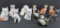 11 animal figurines, cats, birds and polar bear