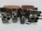 Five vintage 8 mm movie cameras and two cases