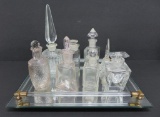 8 clear vintage Glass Perfumes on dresser mirrored tray