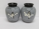 Pair of Tim Leonardelli black cap chickadee vases, 9 1/2