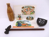 Stoneware bottle, cigar advertising sheets, trivet and cobbler hammer