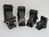 Four Kodak folding cameras