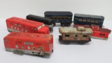 Assorted vintage tin train cars, parts, all are worn