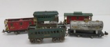 Five metal pre war Lionel cars, wear, some for parts