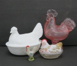 Three covered Chicken and Rooster dishes