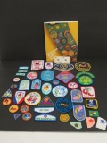 42 Girl Scout patches, book and metal pins