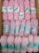 18 pink and pink/white skeins, cotton blend