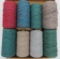 8 large multi color warp rolls, 6