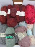 Eleven skeins of yarn, Bernat, Canterbury and Laines, wool blend