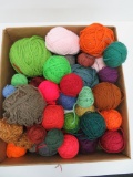 Over 50 yarn balls, most 3