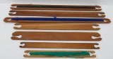Seven wooden stick shuttles, 15 1/2