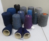 14 blue and grey yarn cones, not for rug making
