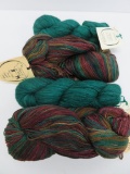 Four skeins of hand dyed yarn, teals and earth tones, cotton and alpaca/silk