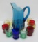 Electric blue pitcher and 10 multi colored 3 1/4