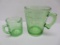 Two green depression glass measuring cups, one cup and 4 cup
