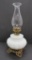 Milk glass font oil lamp with metal base, 16 1/2
