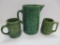 Stoneware pitcher and two stoneware mugs