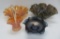 Four pieces of carnival glass, marigold, smoke and blue