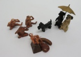 Cast metal animal and advertising Swift meats lot, dogs under umbrella and monkeys