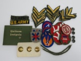 Military lot with patches and pins and uniform insignia booklet