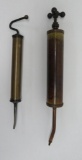 Two brass grease guns, 13