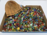 Estimated over 600 machine made marbles and leather marble bag