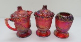 Three red carnival glass pieces, Westmoreland, Peacock pattern