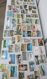 About 175 post cards, Travel, humor and architecture, also Panama Canal photo book