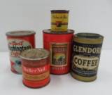 Five miniature coffee containers, one with puzzle