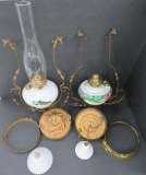 Two partial hanging oil lamps with smoke bells and frames