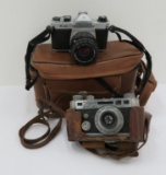 Two vintage 35 mm cameras, Perfex twenty two and Asahi Pentax K1000