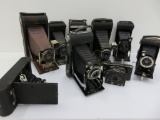 Nine Kodak vintage folding cameras, all have some issues