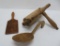 Three wood primitive kitchen utensils, rolling pin and two butter paddles, 9