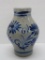 Cobalt floral decorated stoneware pitcher, 9