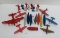 About 24 plastic airplanes, figures, and boat toys, 4