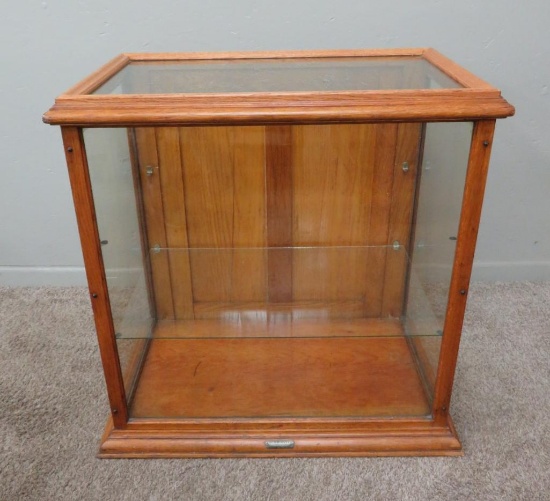 The Neuman Co. Glass Display Case