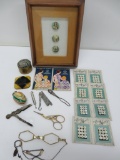 Sewing lot with buttons, scissors, button hooks and folding glasses