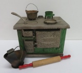 Cast iron and tin Novelty toy cook stove and utensils