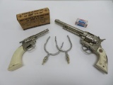 Vintage cap guns, glow in the dark Tom Mix cowboy spurs in box and caps