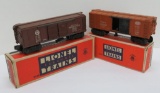 Two vintage Lionel train cars with boxes, 3463 NYC Box Car and 2458 Automobile Car