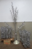 About 8' aluminum Christmas tree with Evergleam rotating musical tree stand