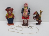 Three vintage tin toys, two are wind up
