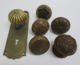 Six lovely ornate brass door knobs