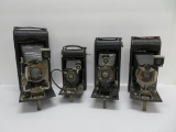 Four vintage folding cameras, Kodak